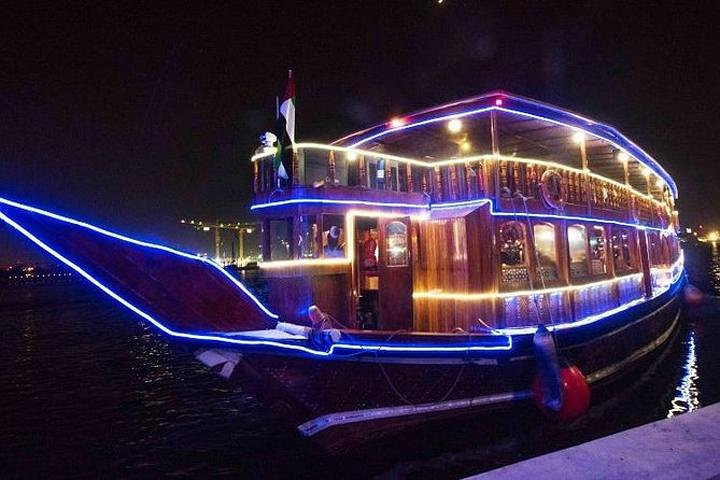 Experience the charm of a traditional dhow gliding along Dubai Creek illuminated by city lights. Enjoy a delicious buffet dinner while being serenaded by live music and cultural performances.